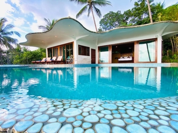 Private infinity edge pool at The Orchid Villa overlooking the beautiful ocean and landscape of Koh Tao